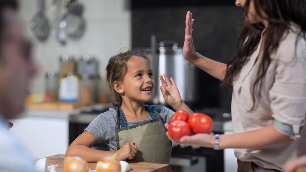 mom with daughter in the kitchen
