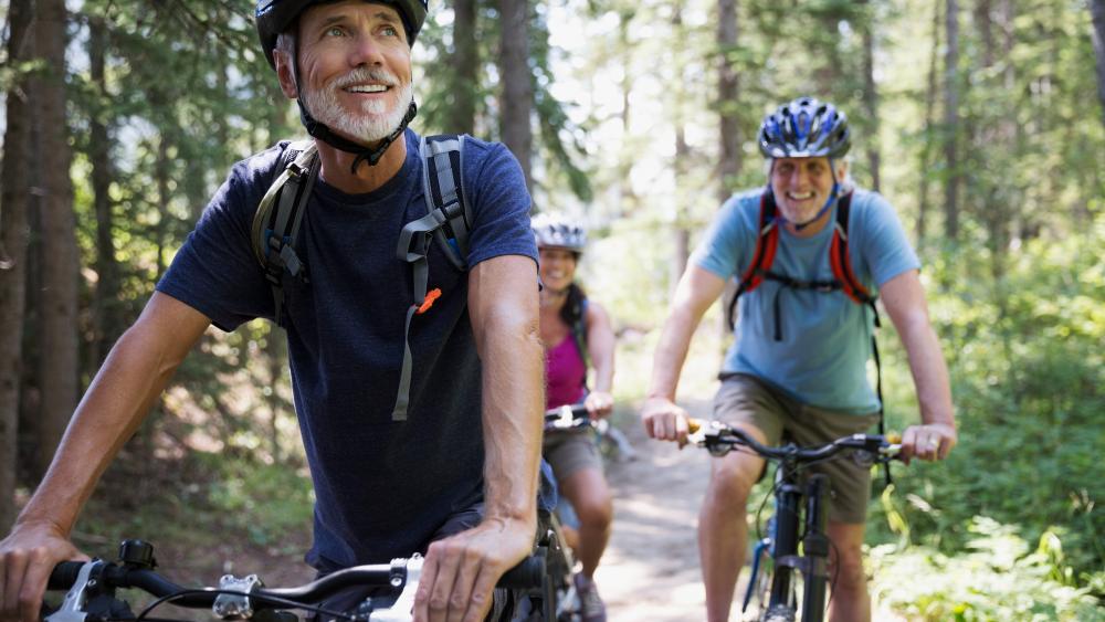 dad with son biking