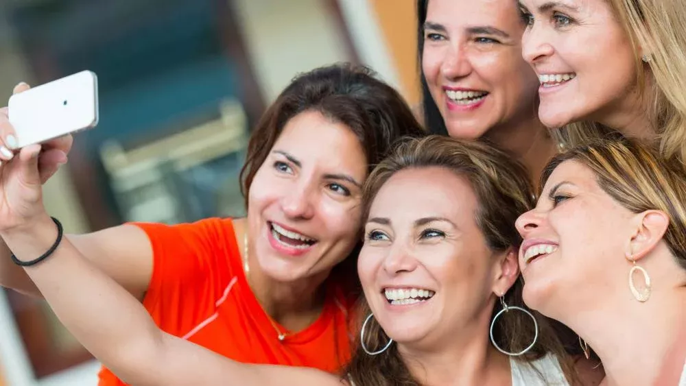 Image of a group of women taking a selfie